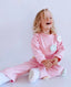 KNITTED TRACKSUIT WITH FLOWER ACCESSORIES