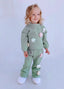 KNITTED TRACKSUIT WITH FLOWER ACCESSORIES