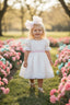 SPECIAL OCCASION BROCADE DRESS WITH ORGANZA TULLE HAIR ACCESSORY