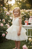 LAYERED TULLE SPECIAL OCCASION DRESS WITH SEQUIN BOW