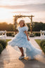 LAYERED ELEGANT GOWN FOR BIRTHDAY SPECIAL OCCASIONS WITH TIARA AND TULLE GLOVE COMBINATION CAN BE WORN WITH A LONG OR SHORT BACK DESIGN