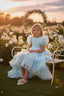 LAYERED ELEGANT GOWN FOR BIRTHDAY SPECIAL OCCASIONS WITH TIARA AND TULLE GLOVE COMBINATION CAN BE WORN WITH A LONG OR SHORT BACK DESIGN