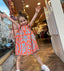 ORANGE BLUE PATTERNED DRESS WITH BOW DETAIL ON THE BACK