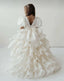 WHITE LAYERED ELEGANT GOWN FOR BIRTHDAY SPECIAL OCCASIONS WITH TIARA AND TULLE GLOVE COMBINATION CAN BE WORN WITH A LONG OR SHORT BACK DESIGN