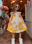 YELLOW DRESS WITH FLOWER EMBROIDERED BOW DETAIL ON THE COLLAR