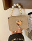 A MINI LOVE TOTE A PEARL HANDHELD METAL CHAIN BAG SUITABLE FOR DAILY OUTINGS AND PARTIES THE BEST CHOICE FOR GIFT AND BIRTHDAY GIFTS