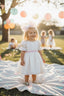 SPECIAL OCCASION BROCADE DRESS WITH ORGANZA TULLE HAIR ACCESSORY