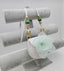 WHITE BAG WITH 3D MINI TULLE FLOWER DESIGN